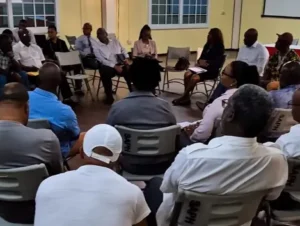 photograph when PM Roosevelt Skerrit met with the Port Workers