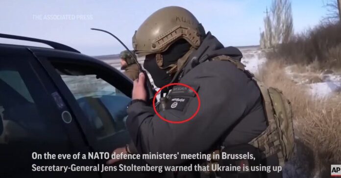 During a Danish TV interview with Ukrainian fighters, one of them was seen with an ISIS flag on his uniform and wearing a patch that read 