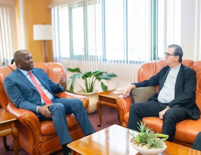 Prime Minister Dr. Roosevelt Skerrit with Apostolic Nuncio Santiago De Wit Guzman