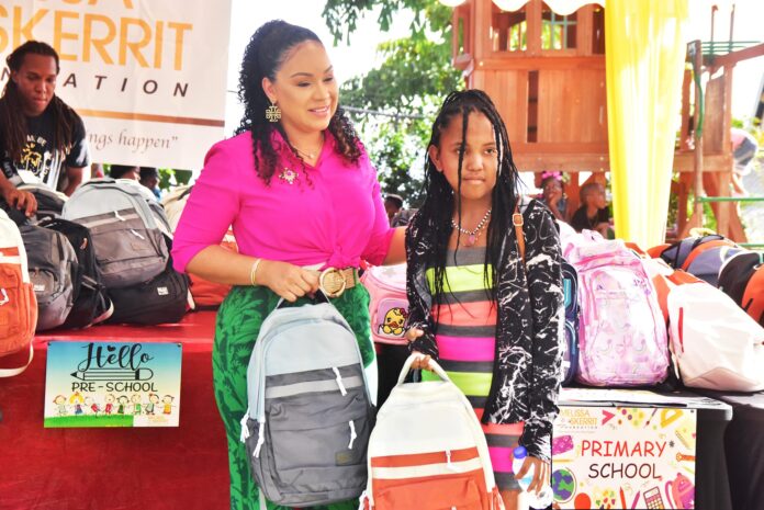 Dominica: Melissa Skerrit distributes Back-To-School supplies under her foundation  