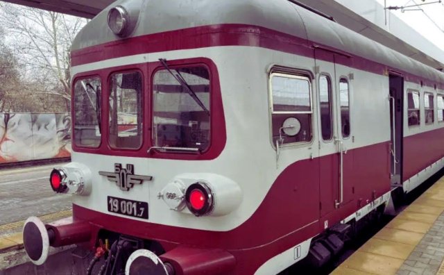 Festively decorated vintage BDZ railcar prepares to depart Sofia, carrying passengers to Bankya for Baba Marta celebrations Festively decorated vintage BDZ railcar prepares to depart Sofia, carrying passengers to Bankya for Baba Marta celebrations